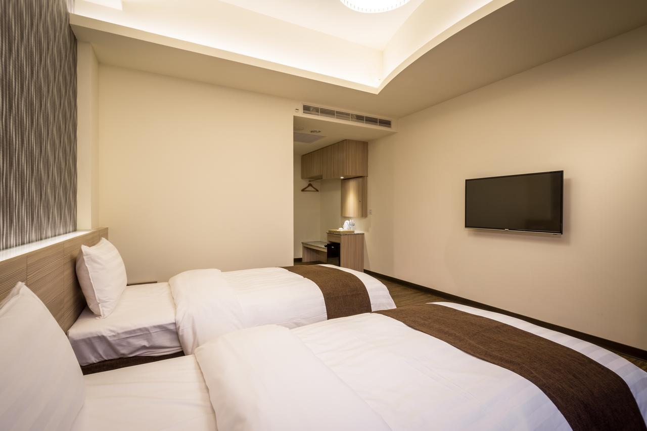 Midu Business Hotel Xiluo Extérieur photo