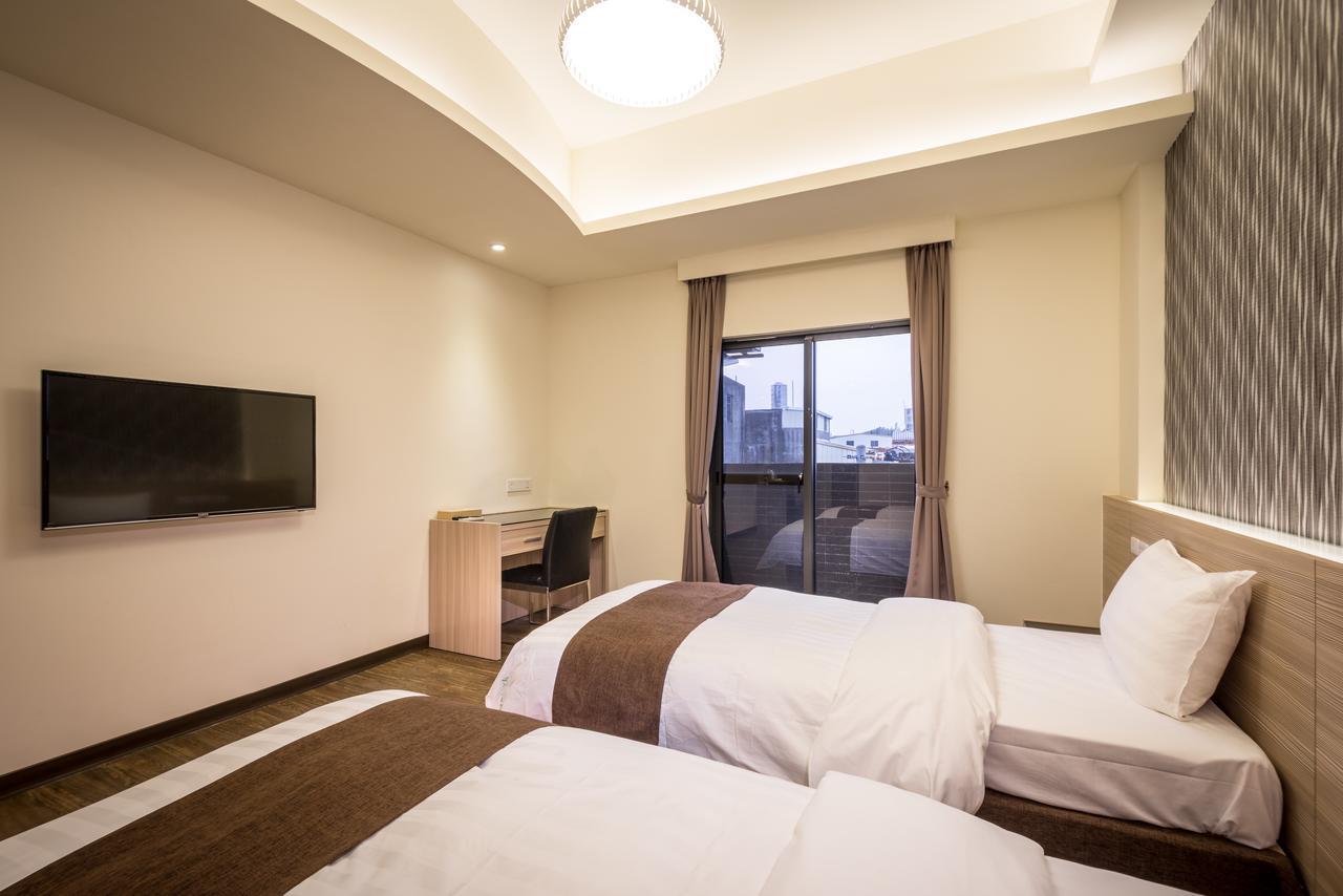 Midu Business Hotel Xiluo Extérieur photo